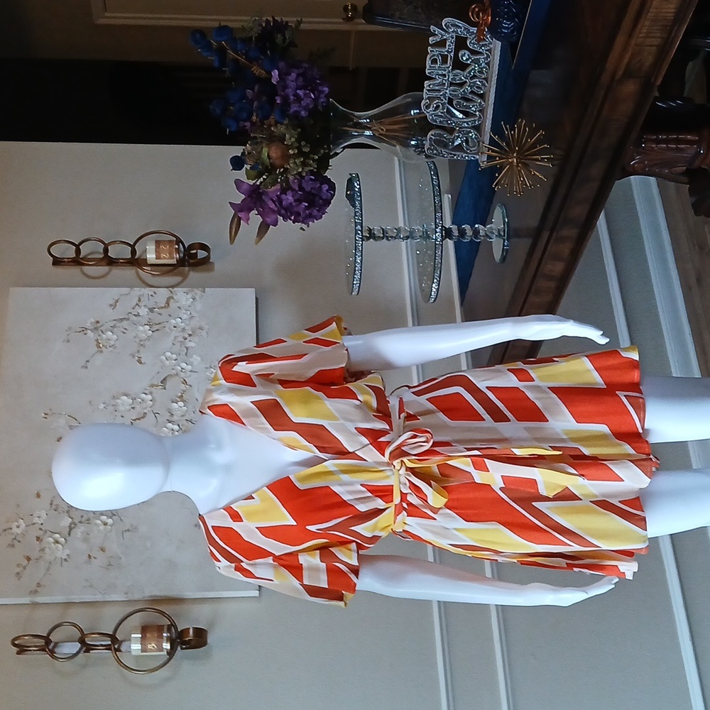 New Vibrant Orange and Yellow Patterned Wrap Mini Rorper. Size L - Picture 6 of 17